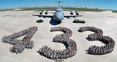 Photo of C-5 and wing personnel
