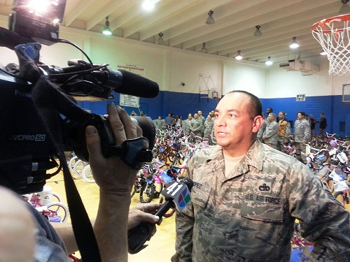 Photo of Airman being interviewed on camera.